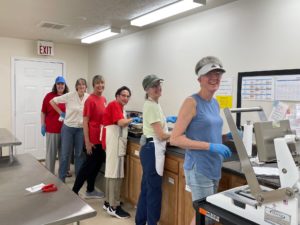 Fluvanna Meals on Wheels Volunteers packing meals in the kitchen.